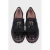 Black tassel loafers