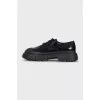 Black brogues with rubber toes