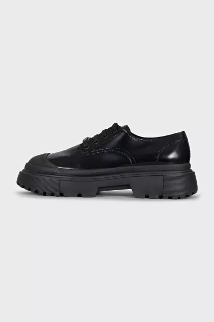 Black brogues with rubber toes