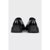 Black brogues with rubber toes