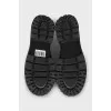 Black brogues with rubber toes
