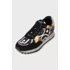Leather sneakers with gold accents
