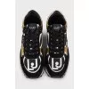 Leather sneakers with gold accents