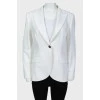 Jacket with button and tag