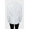 Jacket with button and tag
