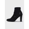 Ankle boots with perforated heels