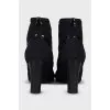 Ankle boots with perforated heels