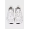 White sneakers with logo laces