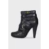 Black ankle boots with strappy heels