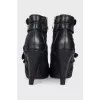 Black ankle boots with strappy heels