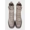 Gray lace-up boots with tag