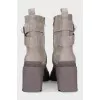 Gray lace-up boots with tag
