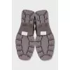Gray lace-up boots with tag