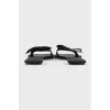Black leather flip flops with a bow
