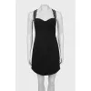 Black dress with straps and tag