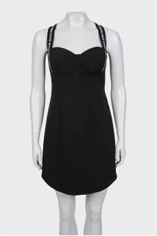 Black dress with straps and tag