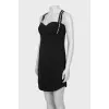 Black dress with straps and tag