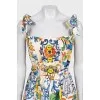 Fitted white sundress with a print