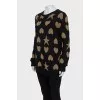 Long black jumper with a print