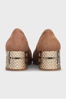 Suede shoes with a metallic heel