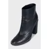 Black ankle boots with beaded embellishment