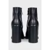 Black ankle boots with beaded embellishment