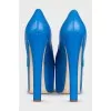 Leather shoes with a high platform and heels