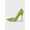 Green leather pumps