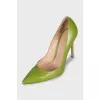 Green leather pumps