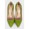 Green leather pumps