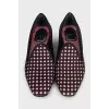 Ballet flats with perforated heels on suede