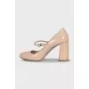 Beige high heels with crystals