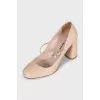 Beige high heels with crystals