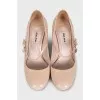 Beige high heels with crystals