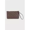 Clutch bag with a signature print and handle