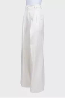White wide-leg trousers with tag
