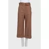 Wide-leg trousers with patch pockets and a belt