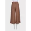 Wide-leg trousers with patch pockets and a belt