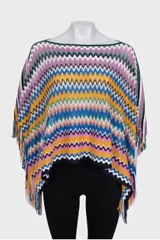 Multicolored cape with fringe