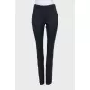 Black tapered wool trousers