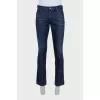 Men's dark blue jeans with decoration
