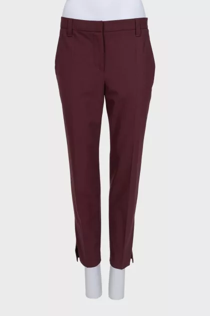 Burgundy trousers with creases