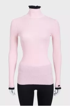 Pink zip-up turtleneck with accent cuffs