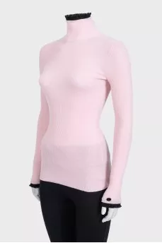 Pink zip-up turtleneck with accent cuffs
