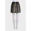 Black skirt with lace in floral print