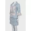 Light blue tweed suit with a belt