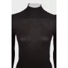 Brown jumper with a tie at the neck
