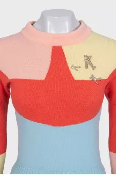 Multicolored jumper with airplanes