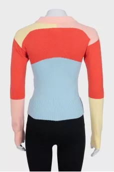 Multicolored jumper with airplanes