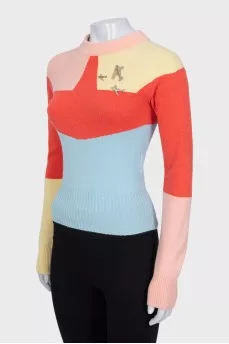 Multicolored jumper with airplanes